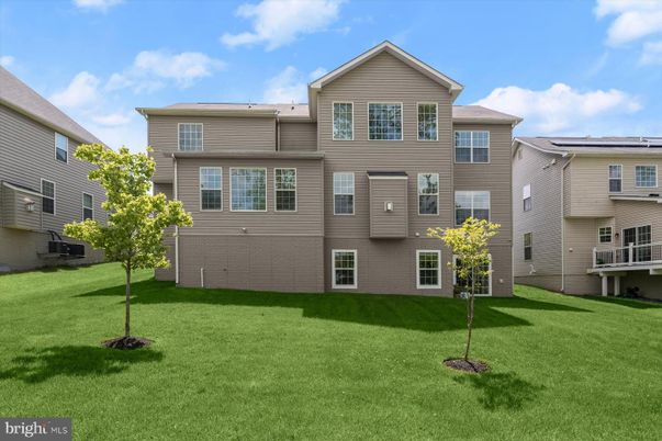 Attached, Exterior, Facade, Solar Panels, Rowhouse