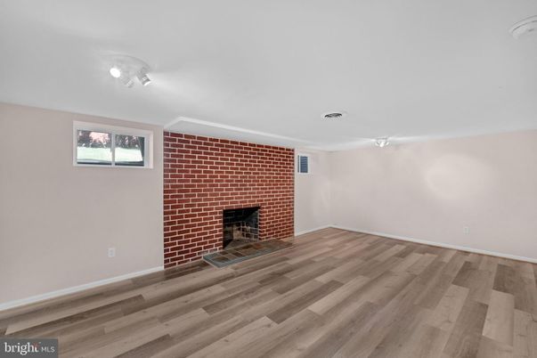Empty room, Fireplace, Interior, Stone Walls, Wood Texture Flooring