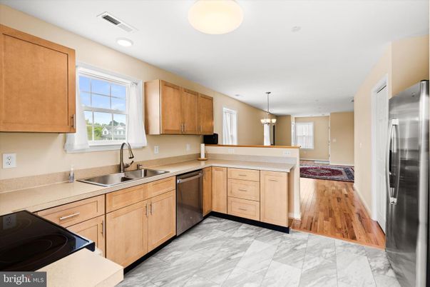 Interior, Kitchen, Marble, Pendant Lights, Recessed Lighting, Stainless Steel Appliances, Wood Texture Flooring