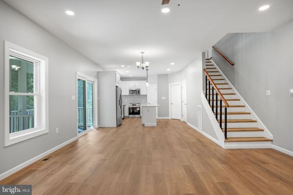 Chandelier, Interior, Kitchen, Recessed Lighting, Stainless Steel Appliances, Wood Texture Flooring