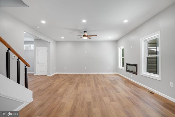 Empty room, Fireplace, Interior, Recessed Lighting, Wood Texture Flooring