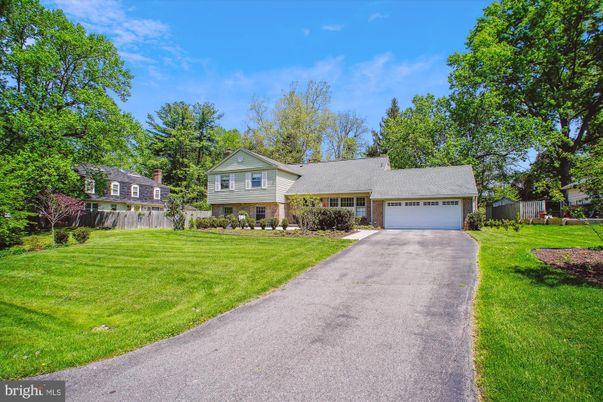Attached, Backyard, Exterior, Facade, Brick Facade, Cape Cod
