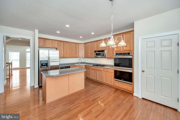 Chandelier, Interior, Kitchen, Pendant Lights, Recessed Lighting, Stainless Steel Appliances, Wood Texture Flooring