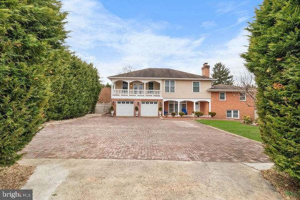 Attached, Backyard, Exterior, Facade, Brick Facade, French Provincial