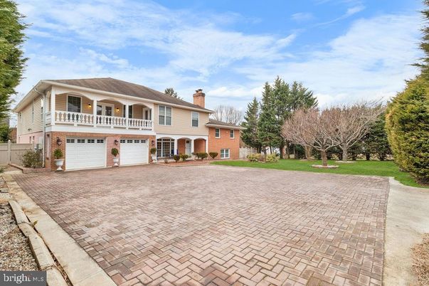Attached, Backyard, Exterior, Facade, Brick Facade, French Provincial