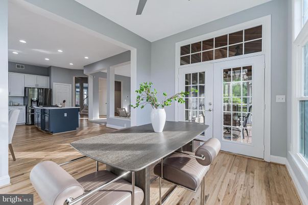 Dining room, Interior, Kitchen, Recessed Lighting, Stainless Steel Appliances, Wood Texture Flooring