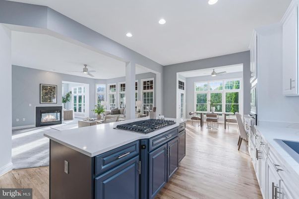 Dining room, Fireplace, Interior, Kitchen, Living room, Recessed Lighting, Wood Texture Flooring