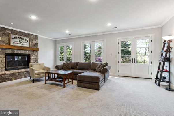 Fireplace, Fitness Equipment, Interior, Living room, Recessed Lighting, Stone Walls