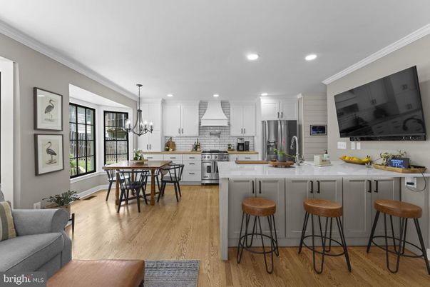 Chandelier, Dining room, Interior, Kitchen, Recessed Lighting, Stainless Steel Appliances, Wood Texture Flooring