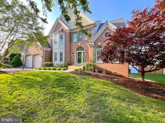 Attached, Backyard, Exterior, Facade, Brick Facade, Brick Traditional