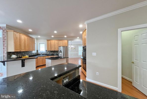 Chandelier, Interior, Kitchen, Recessed Lighting, Stainless Steel Appliances, Wood Texture Flooring