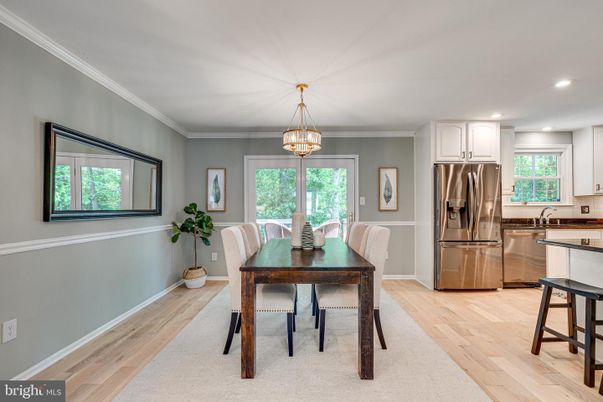 Dining room, Interior, Kitchen, Recessed Lighting, Stainless Steel Appliances, Wood Texture Flooring