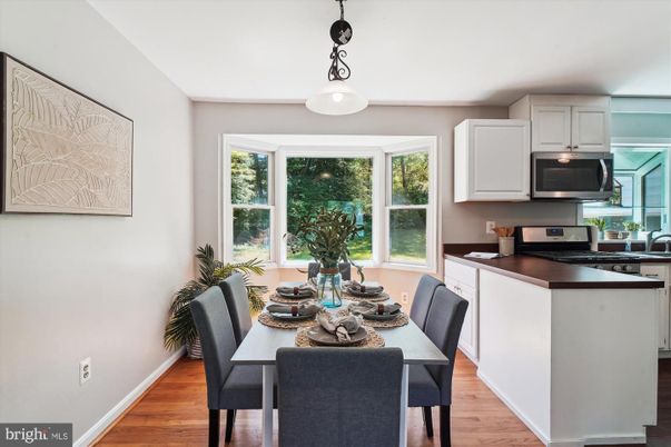 Dining room, Interior, Kitchen, Pendant Lights, Stainless Steel Appliances, Wood Texture Flooring