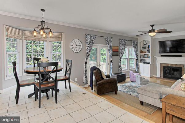 Chandelier, Dining room, Fireplace, Interior, Living room, Pendant Lights, Wood Texture Flooring