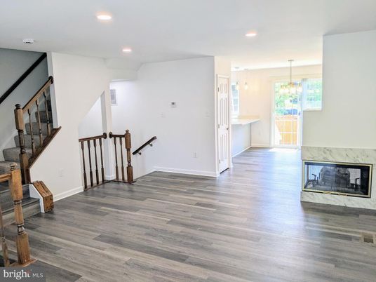 Empty room, Fireplace, Interior, Pendant Lights, Recessed Lighting, Wood Texture Flooring