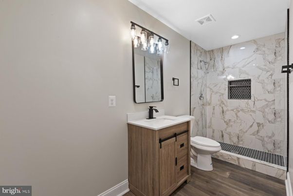 Bathroom, Interior, Marble Walls, Recessed Lighting, Wood Texture Flooring