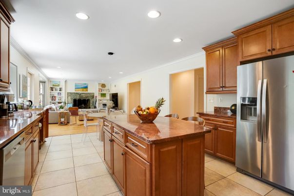 Dining room, Fireplace, Interior, Kitchen, Living room, Recessed Lighting, Stainless Steel Appliances, Wood Texture Flooring