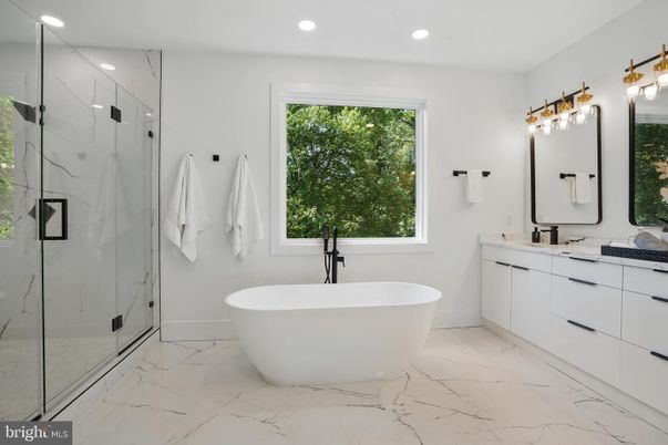 Bathroom, Dual Sink Vanities, Free Standing Baths, Glass Shower, Interior, Marble, Marble Walls, Recessed Lighting