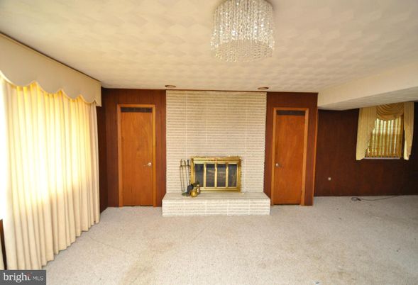 Chandelier, Empty room, Fireplace, Interior