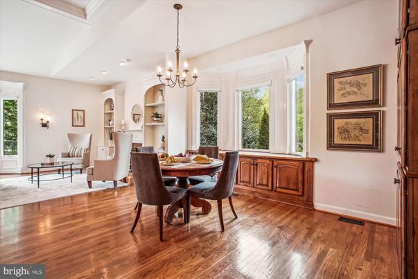 Chandelier, Dining room, Fireplace, Interior, Living room, Recessed Lighting, Wood Texture Flooring