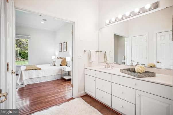 Bathroom, Bedroom, Dual Sink Vanities, Interior, Recessed Lighting, Wood Texture Flooring