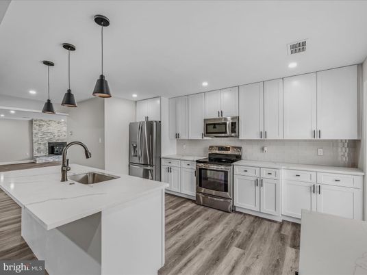 Interior, Kitchen, Pendant Lights, Recessed Lighting, Stainless Steel Appliances, Wood Texture Flooring