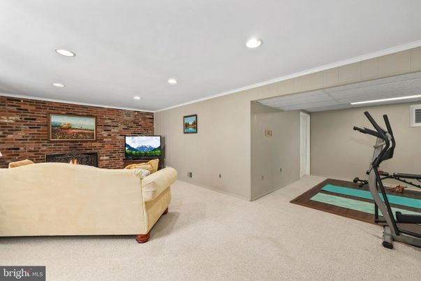 Fireplace, Fitness Equipment, Interior, Recessed Lighting, Stone Walls