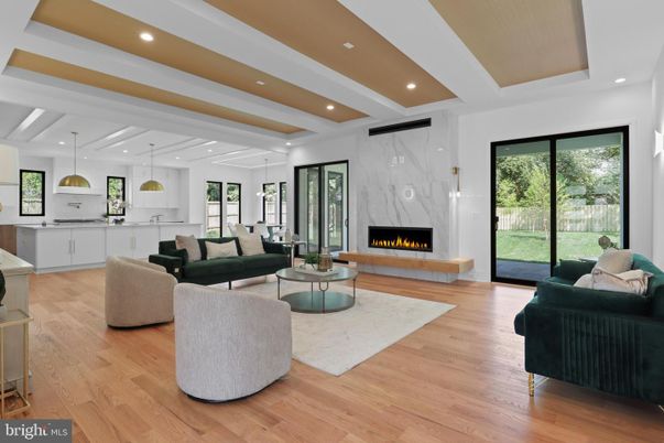 Fireplace, Interior, Living room, Marble Walls, Pendant Lights, Recessed Lighting, Wood Texture Flooring