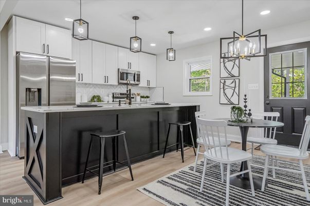Dining room, Interior, Kitchen, Pendant Lights, Recessed Lighting, Stainless Steel Appliances, Wood Texture Flooring