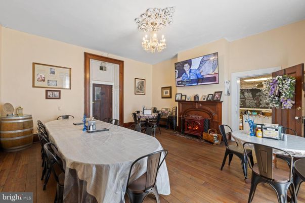 Chandelier, Dining room, Fireplace, Interior, Wood Texture Flooring