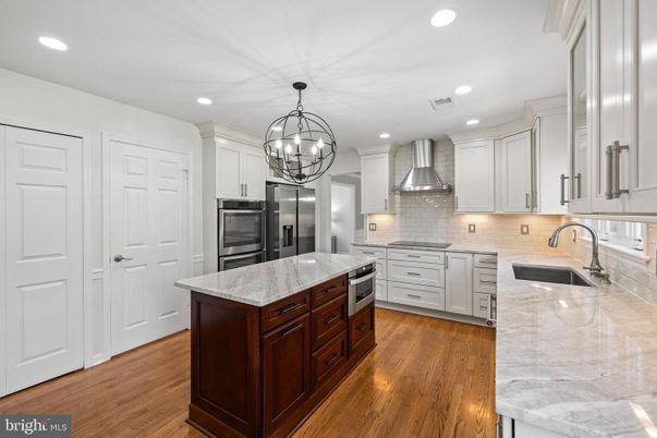Chandelier, Interior, Kitchen, Recessed Lighting, Stainless Steel Appliances, Wood Texture Flooring