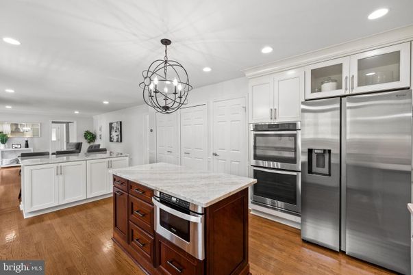 Chandelier, Interior, Kitchen, Recessed Lighting, Stainless Steel Appliances, Wood Texture Flooring