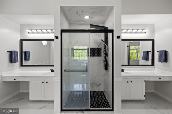 Bathroom, Dual Sink Vanities, Glass Shower, Interior, Marble, Marble Walls, Recessed Lighting
