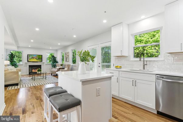 Fireplace, Interior, Kitchen, Living room, Recessed Lighting, Stainless Steel Appliances, Wood Texture Flooring
