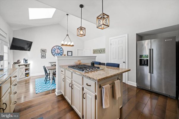Dining room, Interior, Kitchen, Pendant Lights, Stainless Steel Appliances, Wood Texture Flooring