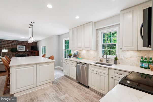 Interior, Kitchen, Pendant Lights, Recessed Lighting, Stainless Steel Appliances, Stone Walls, Wood Texture Flooring