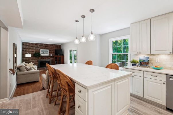Dining room, Fireplace, Interior, Kitchen, Pendant Lights, Recessed Lighting, Stone Walls, Wood Texture Flooring