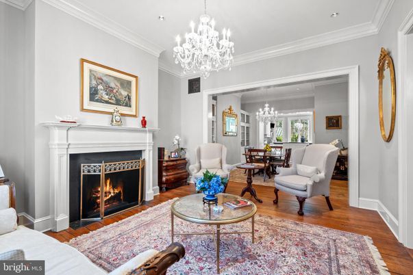 Chandelier, Dining room, Fireplace, Interior, Living room, Recessed Lighting, Wood Texture Flooring