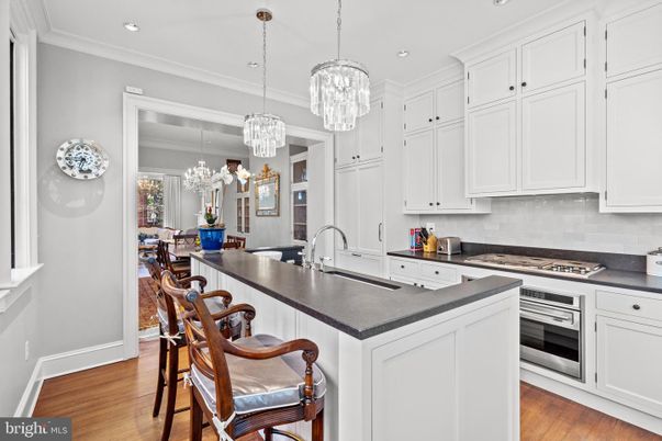 Chandelier, Interior, Kitchen, Pendant Lights, Recessed Lighting, Stainless Steel Appliances, Wood Texture Flooring
