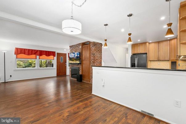 Fireplace, Interior, Kitchen, Pendant Lights, Recessed Lighting, Stone Walls, Wood Texture Flooring
