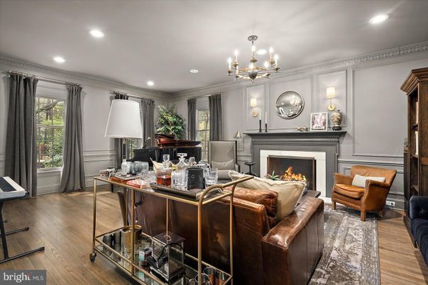 Chandelier, Fireplace, Interior, Living room, Piano, Recessed Lighting, Wood Texture Flooring