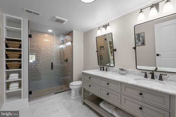 Bathroom, Dual Sink Vanities, Glass Shower, Interior, Marble, Recessed Lighting