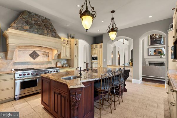 Fireplace, Interior, Kitchen, Pendant Lights, Recessed Lighting, Stainless Steel Appliances
