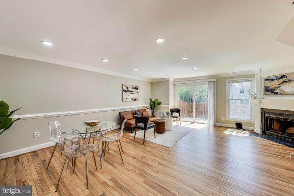 Dining room, Fireplace, Interior, Living room, Recessed Lighting, Wood Texture Flooring