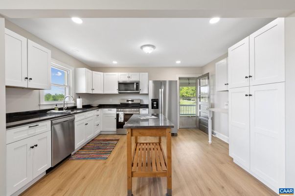 Interior, Kitchen, Recessed Lighting, Stainless Steel Appliances, Wood Texture Flooring