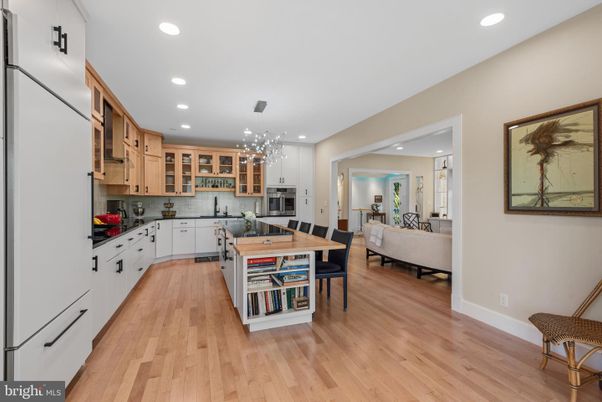 Dining room, Interior, Kitchen, Living room, Pendant Lights, Recessed Lighting, Stainless Steel Appliances, Wood Texture Flooring