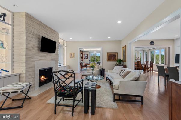 Dining room, Fireplace, Interior, Living room, Recessed Lighting, Wood Texture Flooring