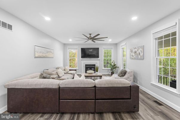 Fireplace, Interior, Living room, Recessed Lighting, Wood Texture Flooring