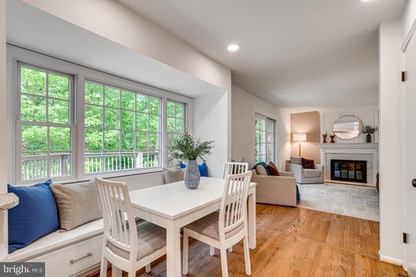 Dining room, Fireplace, Interior, Living room, Recessed Lighting, Wood Texture Flooring