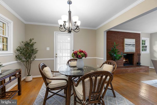Chandelier, Dining room, Fireplace, Interior, Stone Walls, Wood Texture Flooring